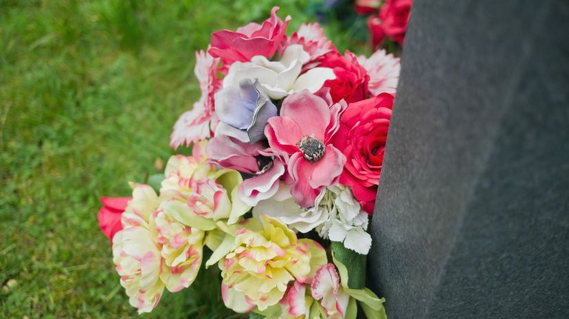 Flowers on a grave in a churchyard