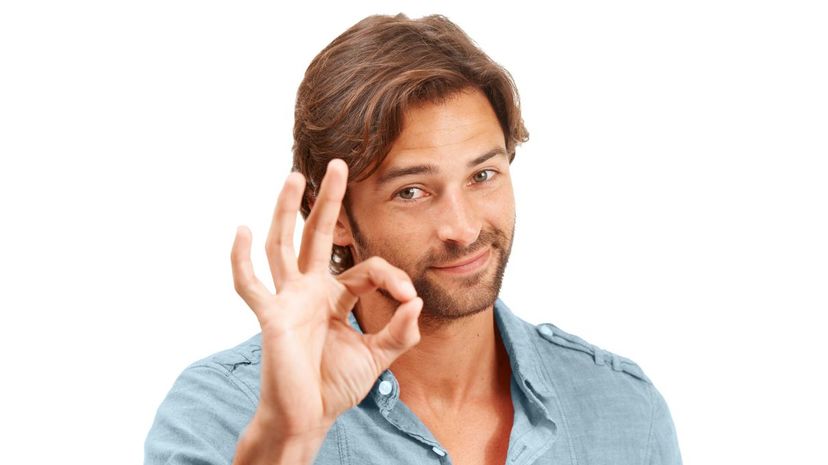 Man showing an OK sign with his fingers