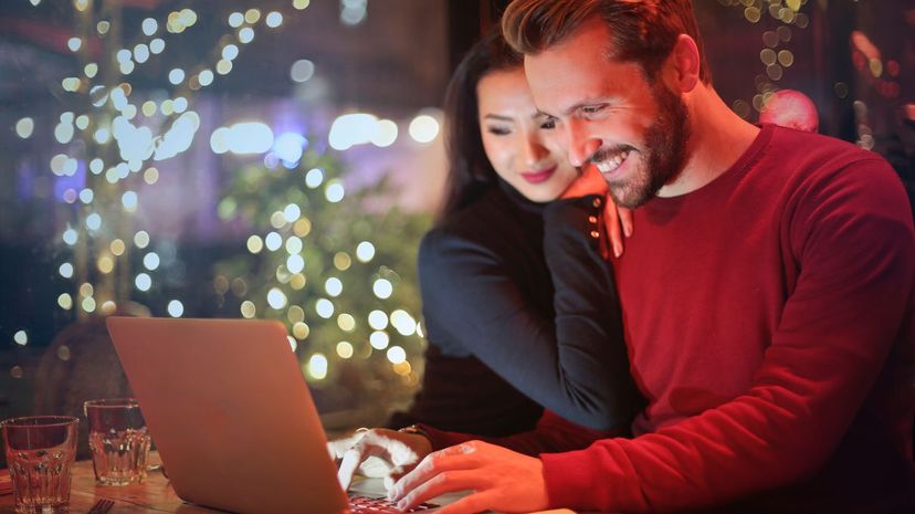 Couple Using Laptop