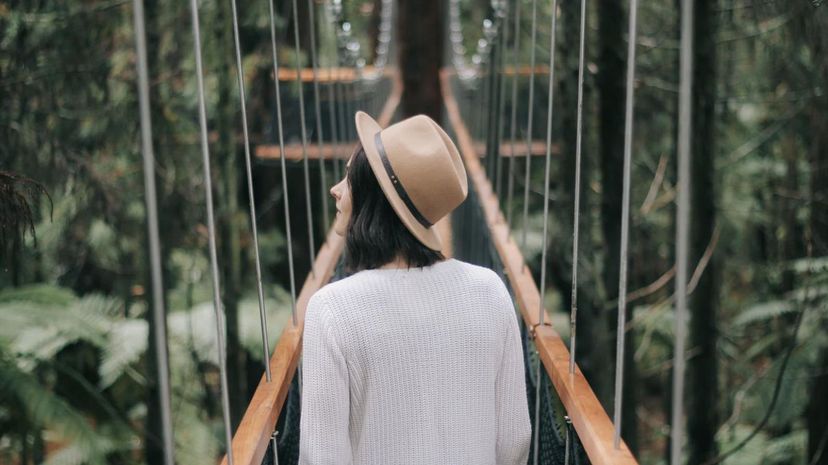 Woman jungle bridge