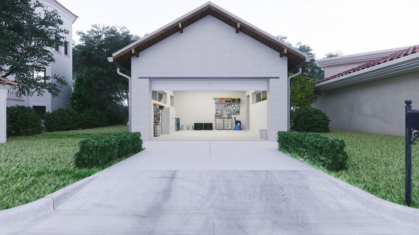 Open Garage With Concrete Driveway