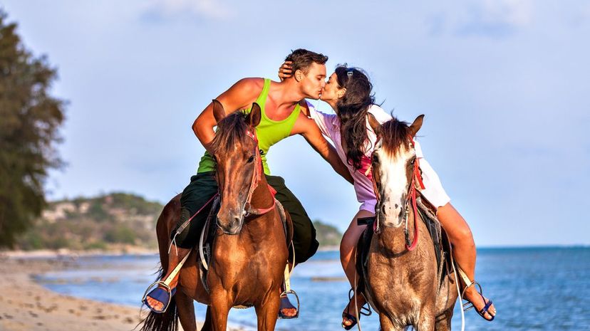 28 horse riding on beach