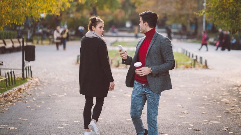 Man looking at woman