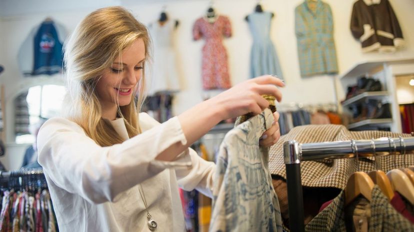 Woman looking at top garment