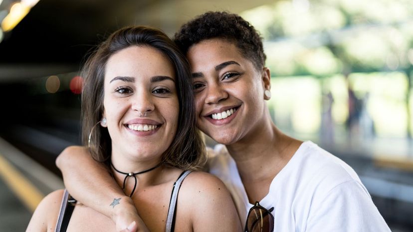 Smiling women couple