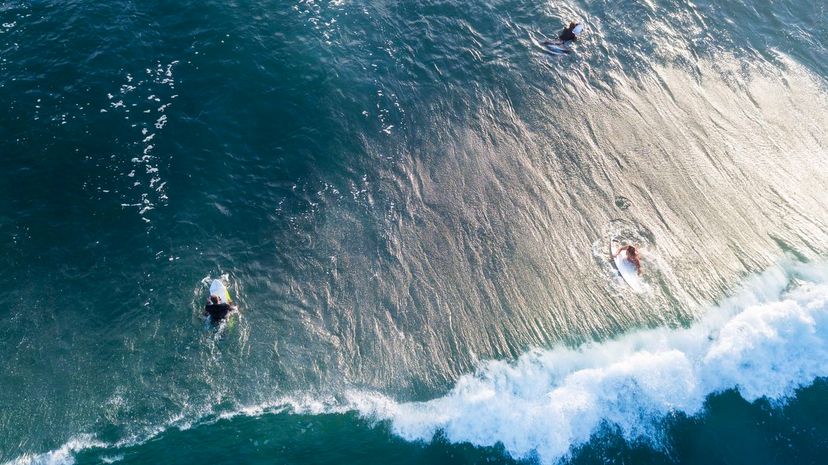 Ocean waters with surfers