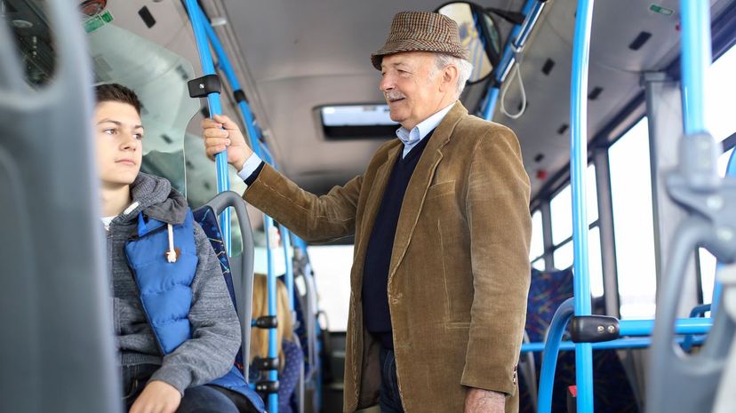 Boy and senior on the bus