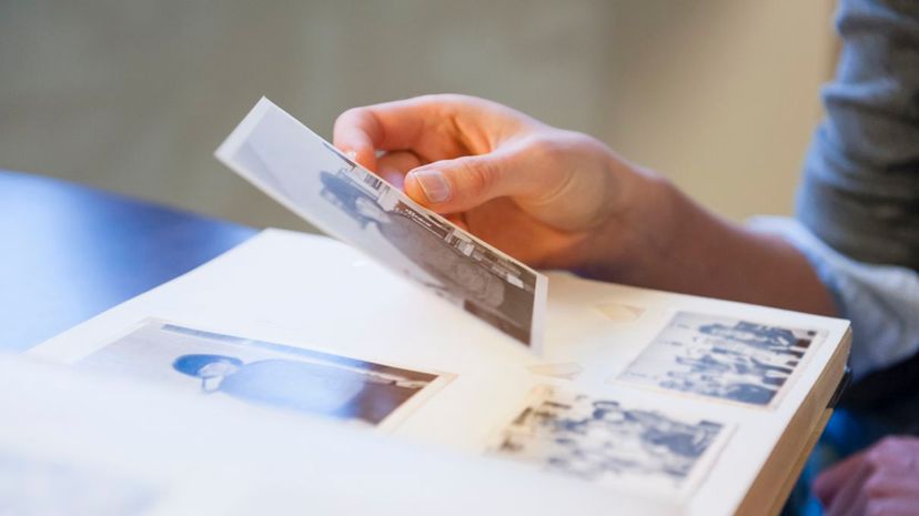 Woman holding photo album