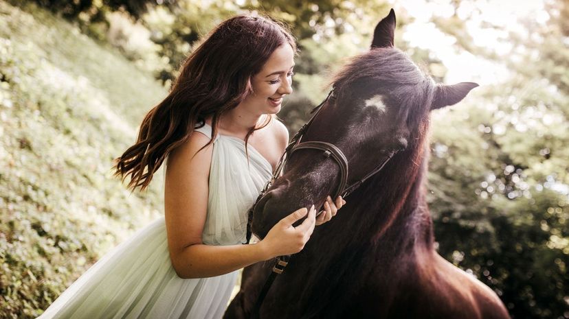 Young woman with horse