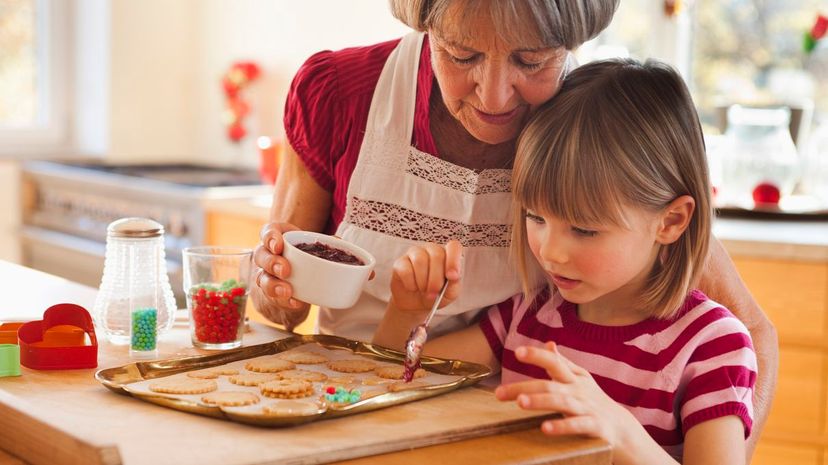 Grandma and granddaughter baking