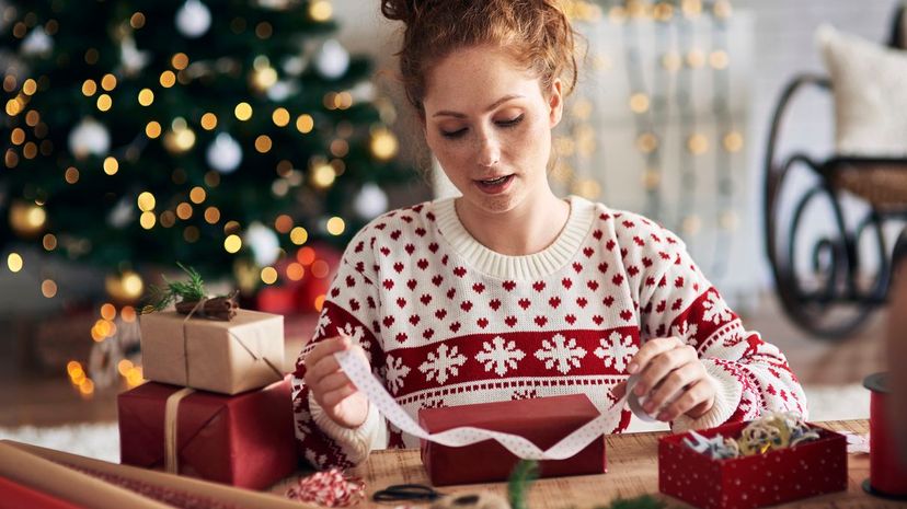 Woman Wrapping Christmas gifts