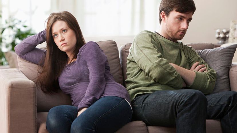 Couple annoyed on couch