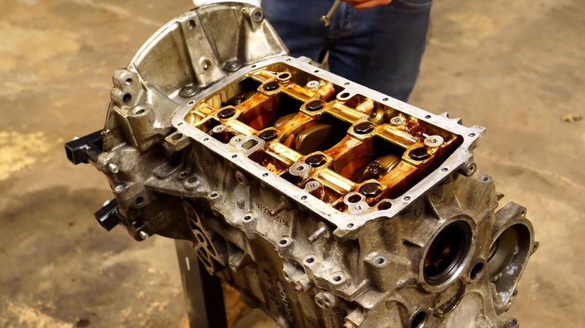 12 - cylinder head and the engine block 