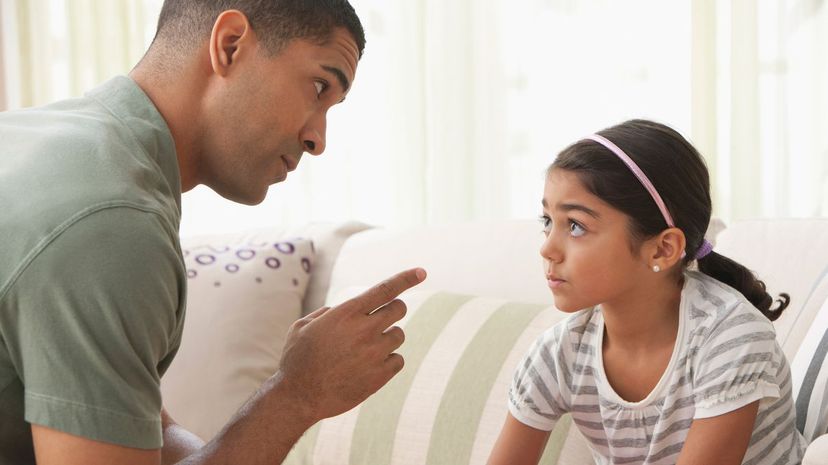 Father giving daughter lecture