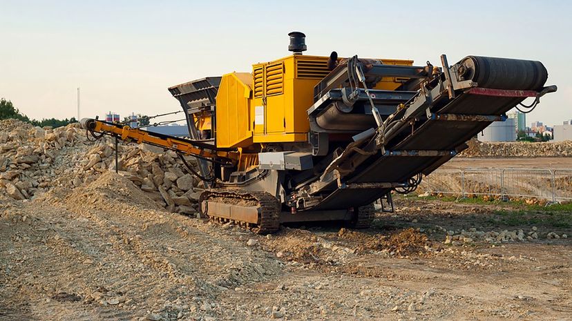On construction sites, what task does a crusher perform?