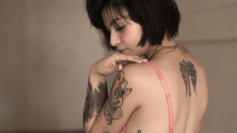Woman Many Tattoos
