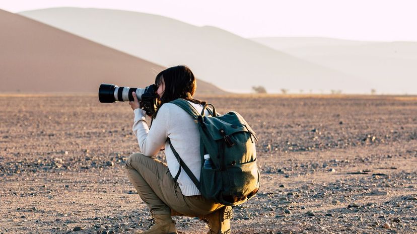 Photographer in desert