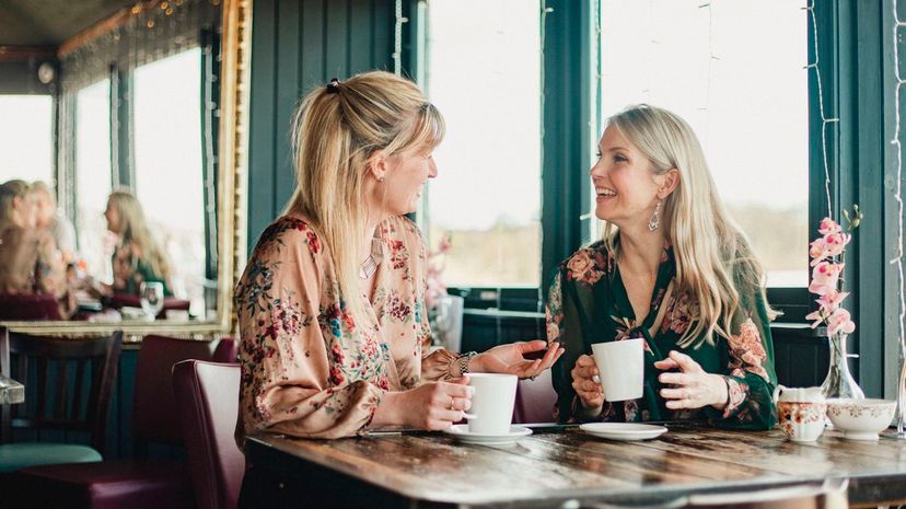 Two women speaking