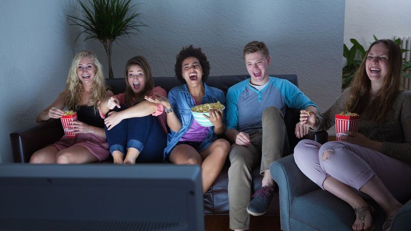 Teenagers watching TV