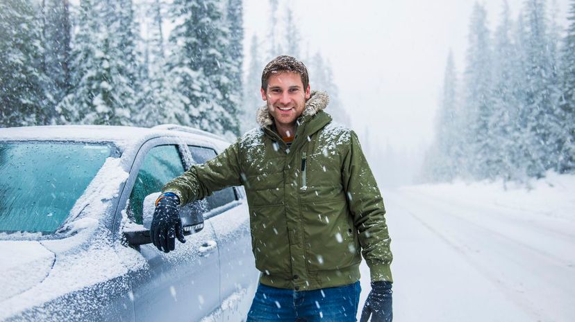 Guy Posing with Car in Winter