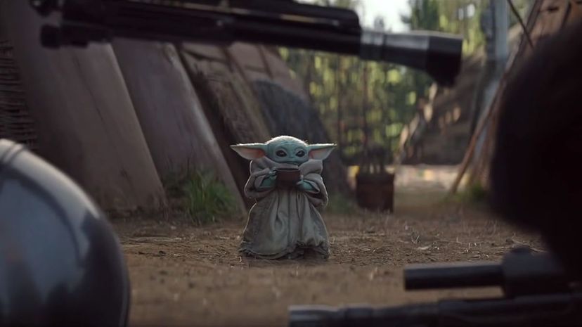 Baby Yoda having soup