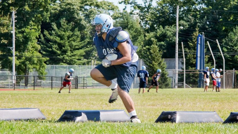 High school football player training