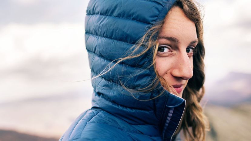 Girl on windy mountain