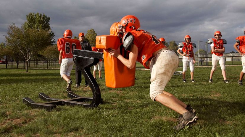 American football players training in field