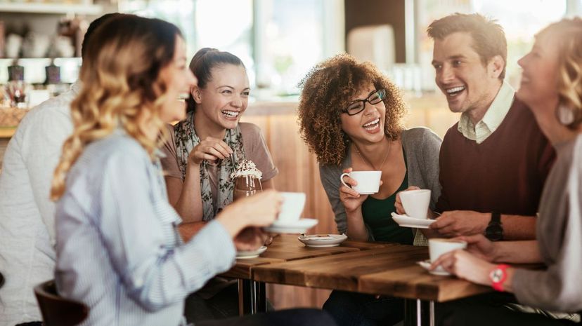 Friends having coffee in cafe