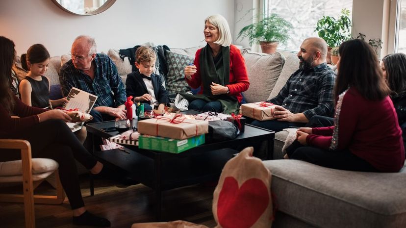 Family opening Christmas presents