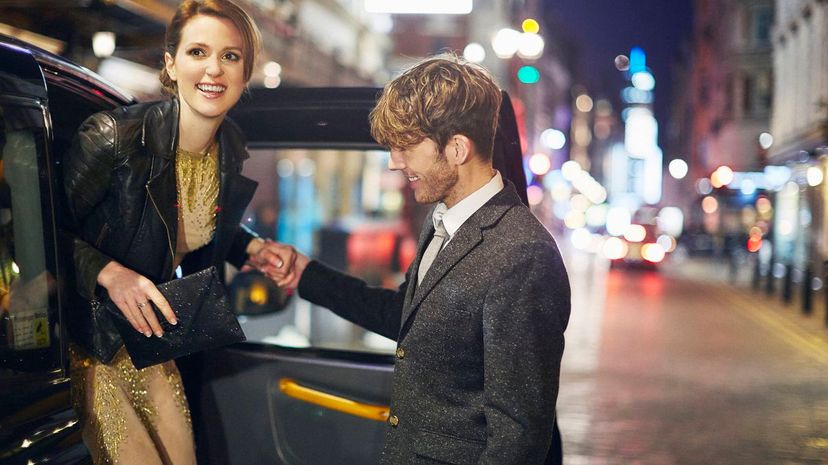 Couple Exiting Taxi