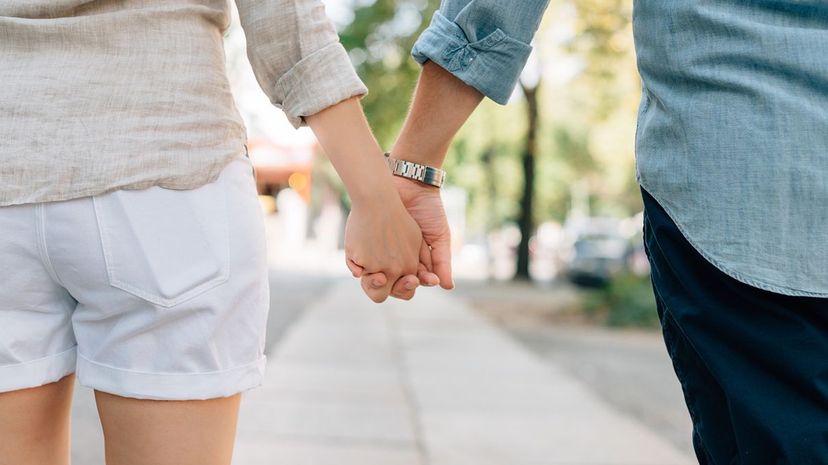 Couple Hold Hands