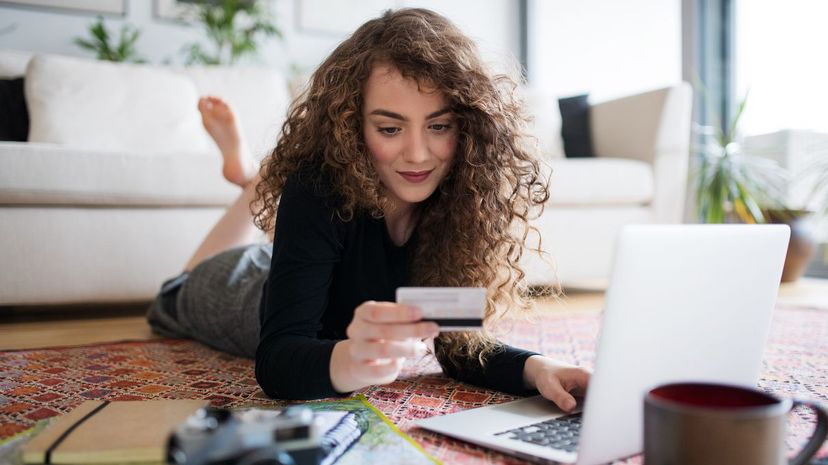 Girl holding credit card