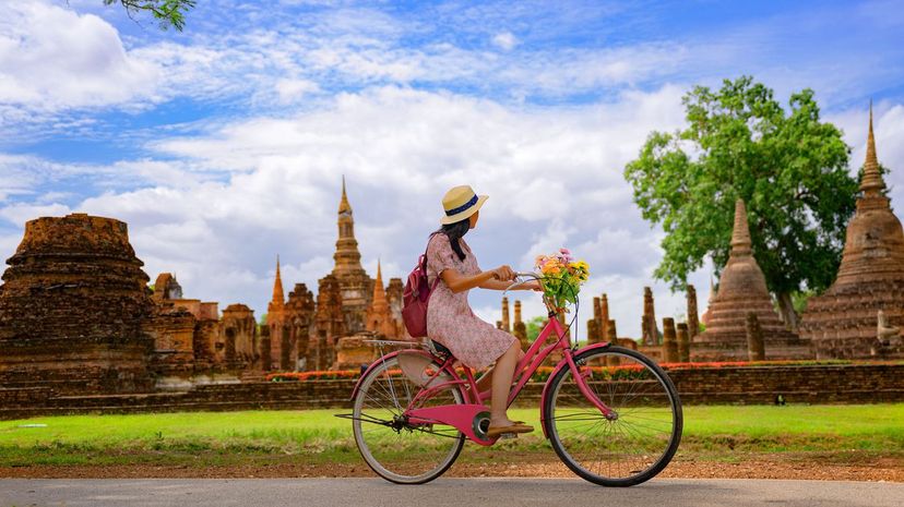 Tourist sightseeing Thailand by bike