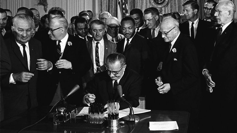 10 Lyndon Johnson signing Civil Rights Act 1964