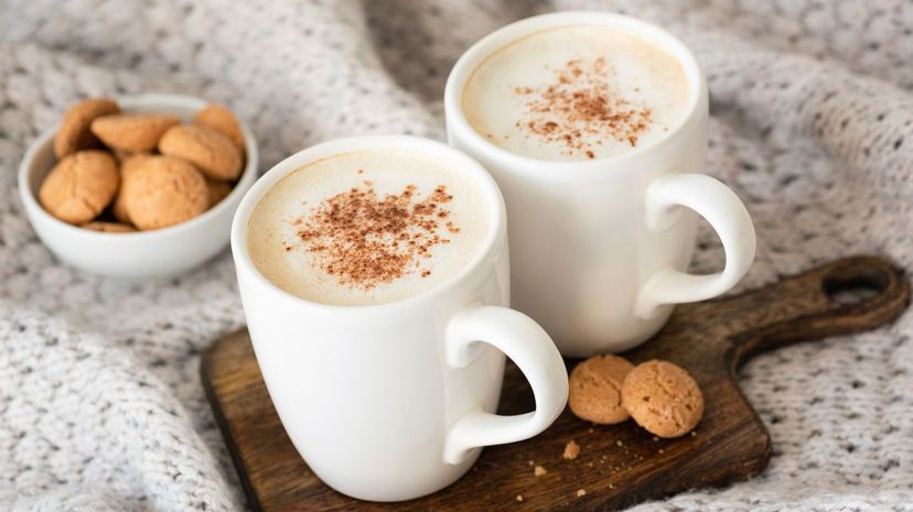 latte with cinnamon and cookies
