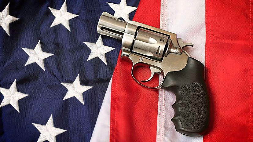 Gun on American Flag
