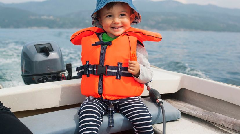 Boy enjoying boat ride