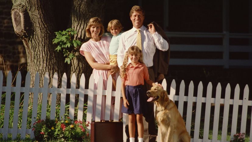 family and picket fence