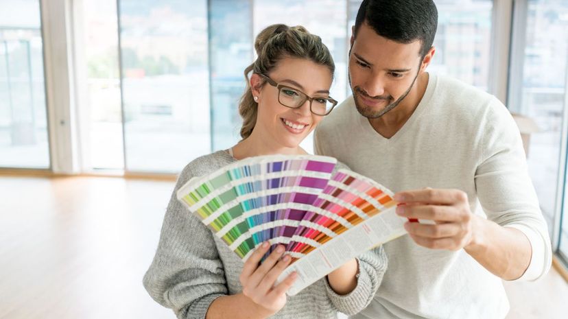 Couple choosing a color from a palette