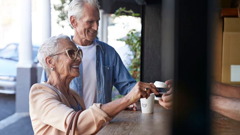 senior couple ordering coffee