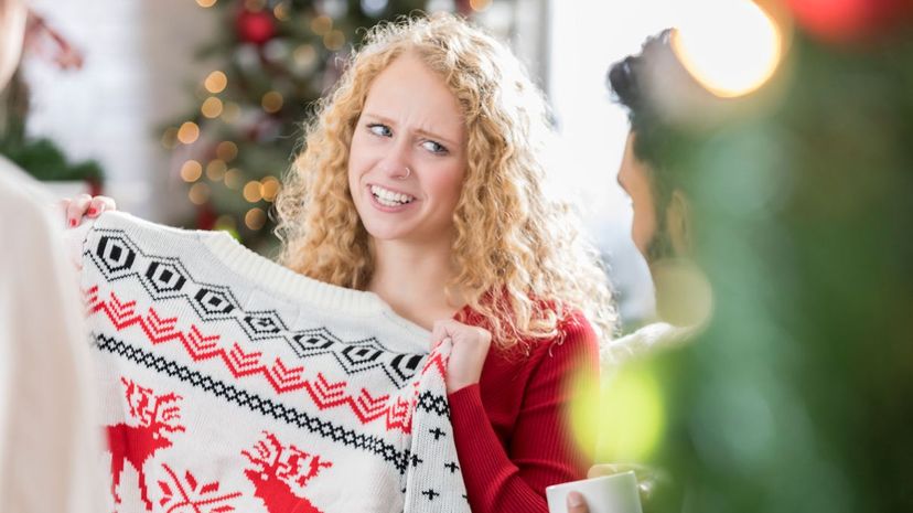 Woman receives ugly Christmas sweater at party