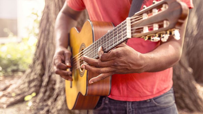 Man Play Guitar