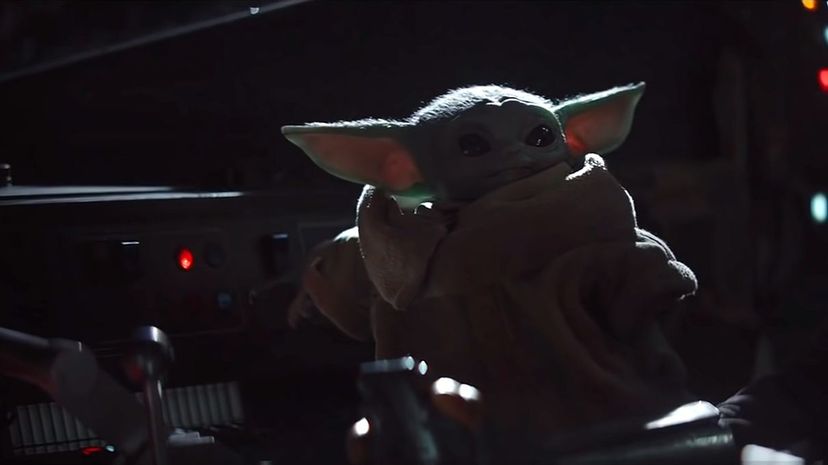 Baby Yoda pressing buttons