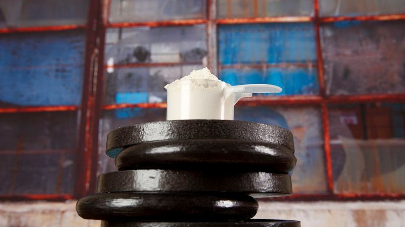 Barbell weights and protein powder