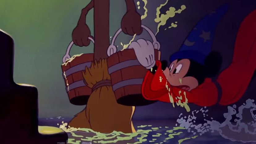 Mickey Mouse tries to stop a broom from flooding a room