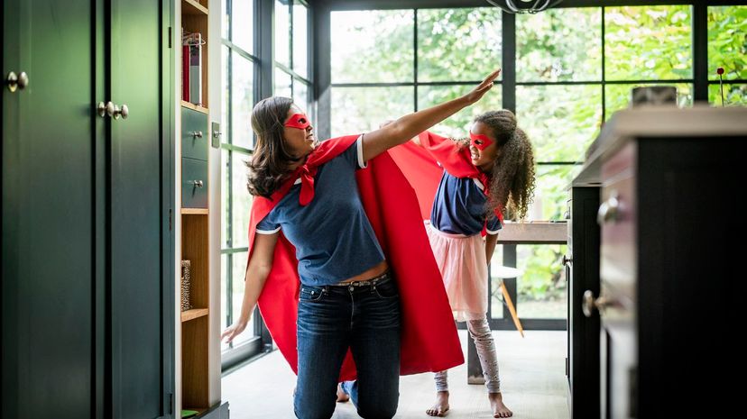 Superhero mom and daughter