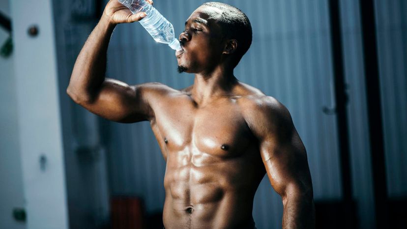 handsome black man shirtless after workout