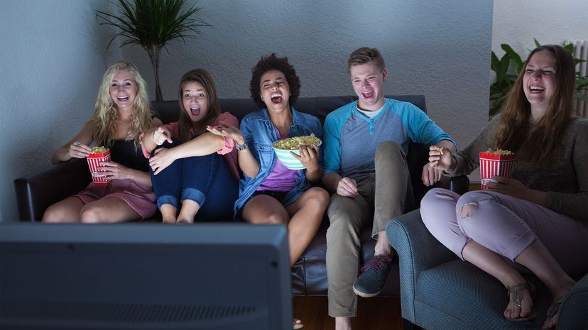 Young people watching TV
