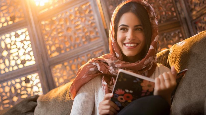 muslim woman with book